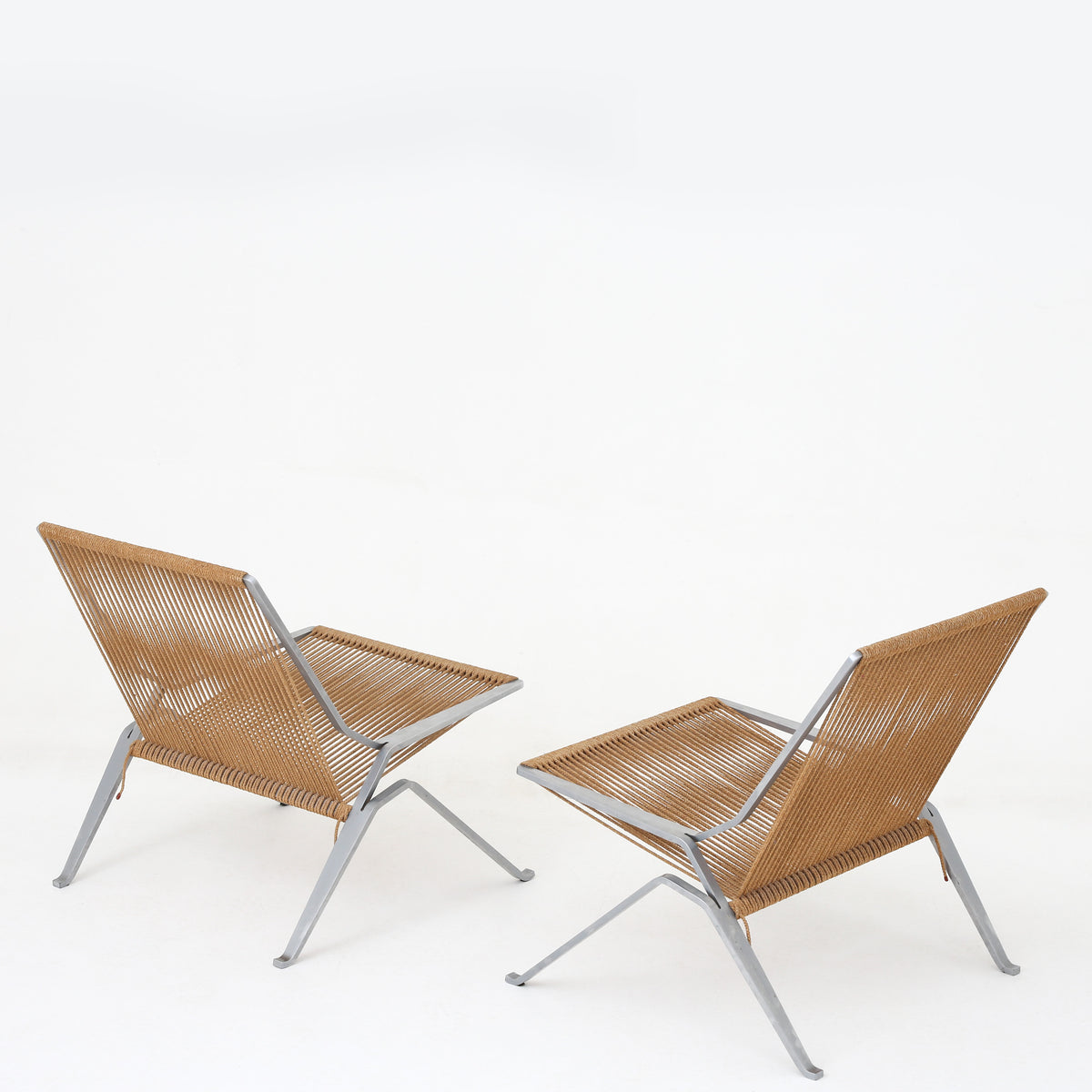 PK 25 - Pair of rare easy chairs