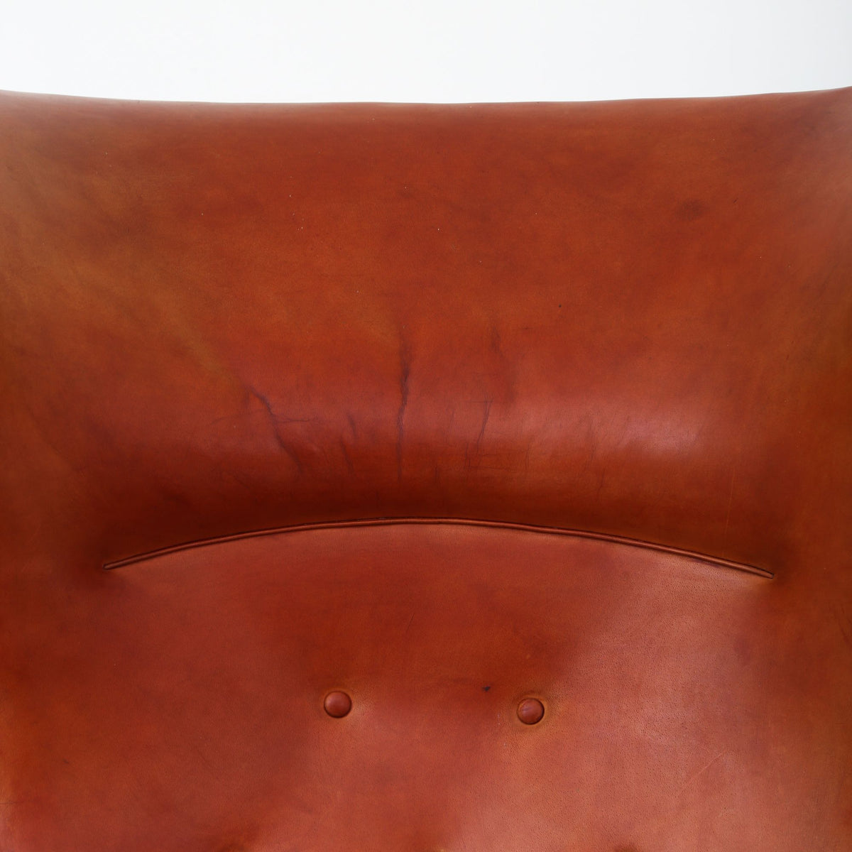 A pair of rare 'Wingback' armchairs