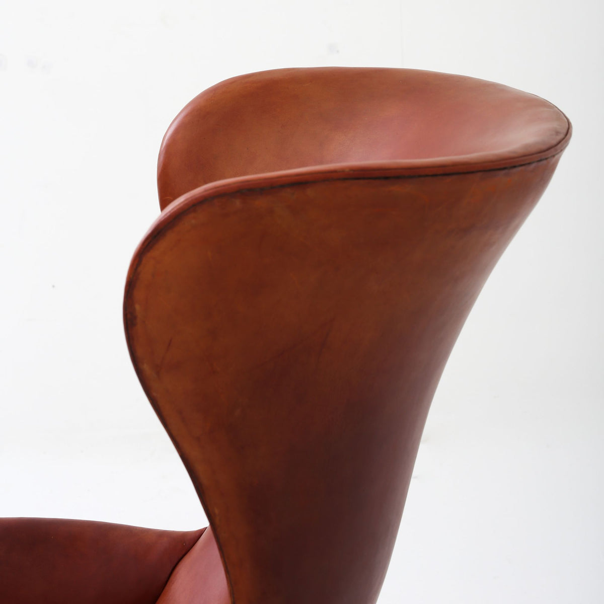 A pair of rare 'Wingback' armchairs