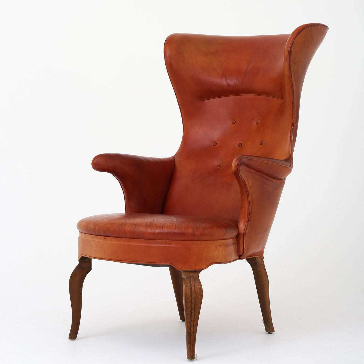 A pair of rare 'Wingback' armchairs