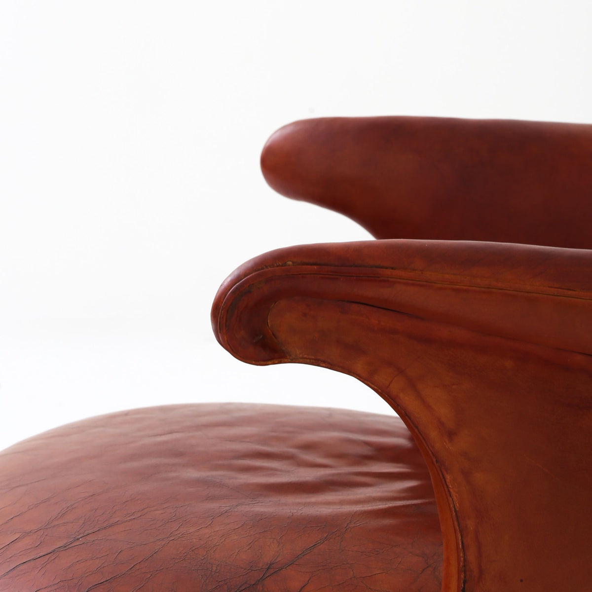 A pair of rare 'Wingback' armchairs