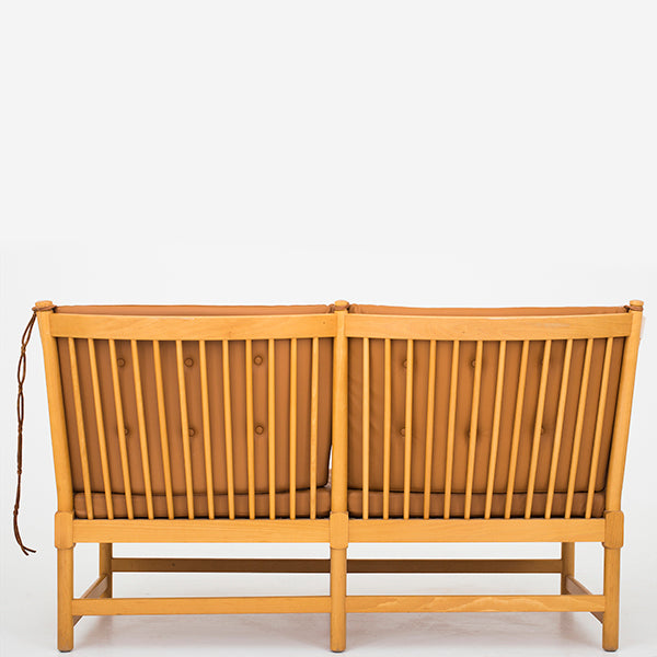 Cushions for the Spoke back sofa in brown leather