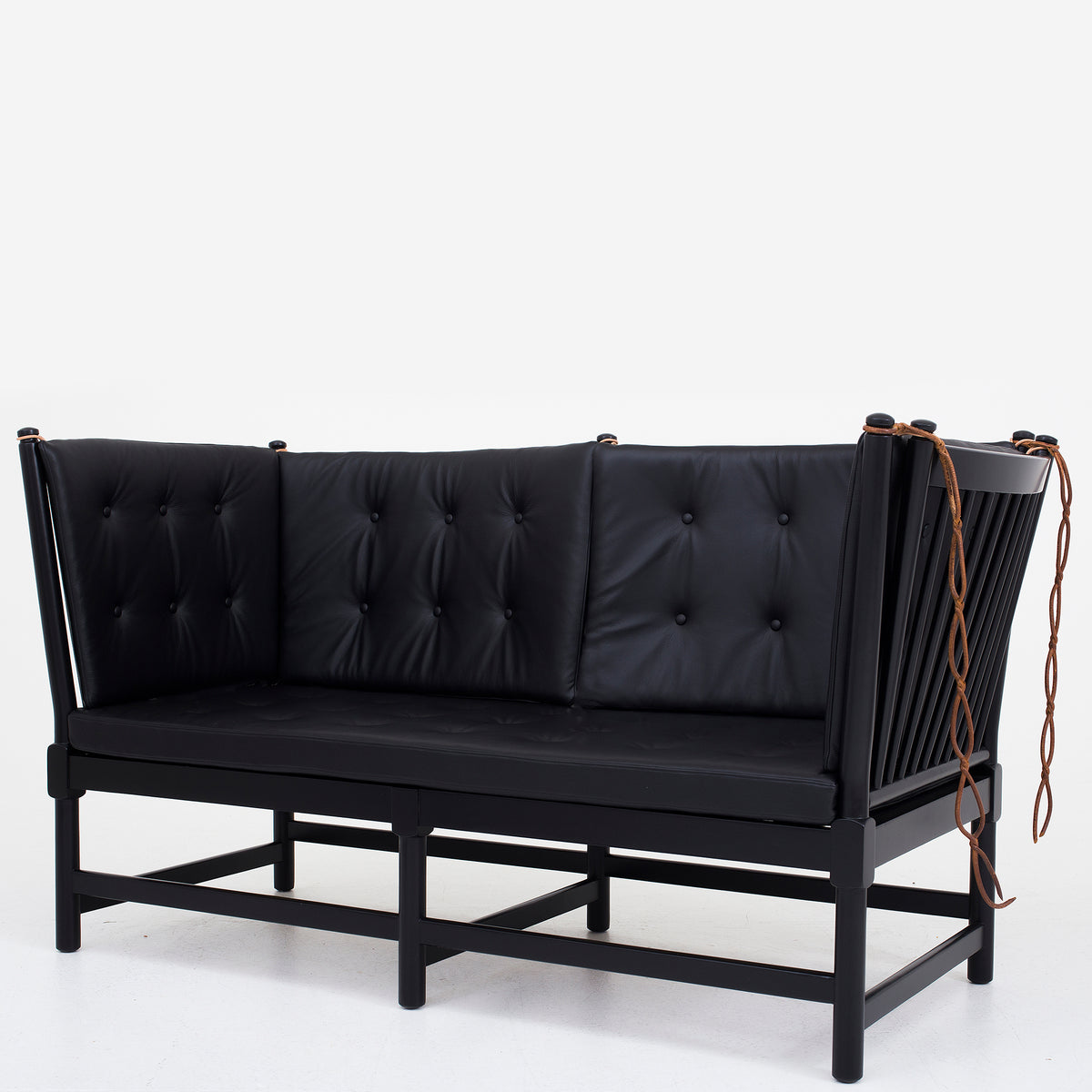 BM 1789 - Spoke back sofa in black leather