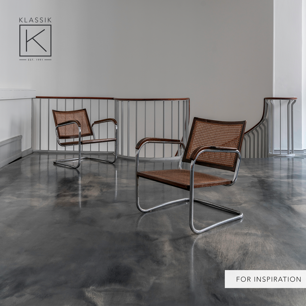 S102 - Pair of rare easy chairs in stained beech
