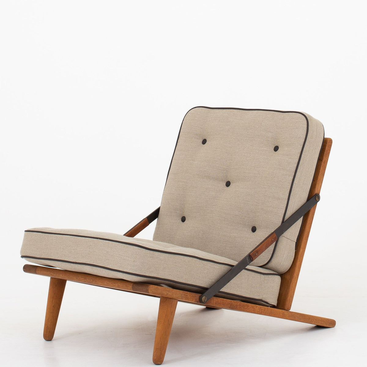 Easy chair in patinated oak