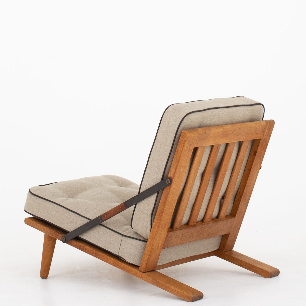 Easy chair in patinated oak