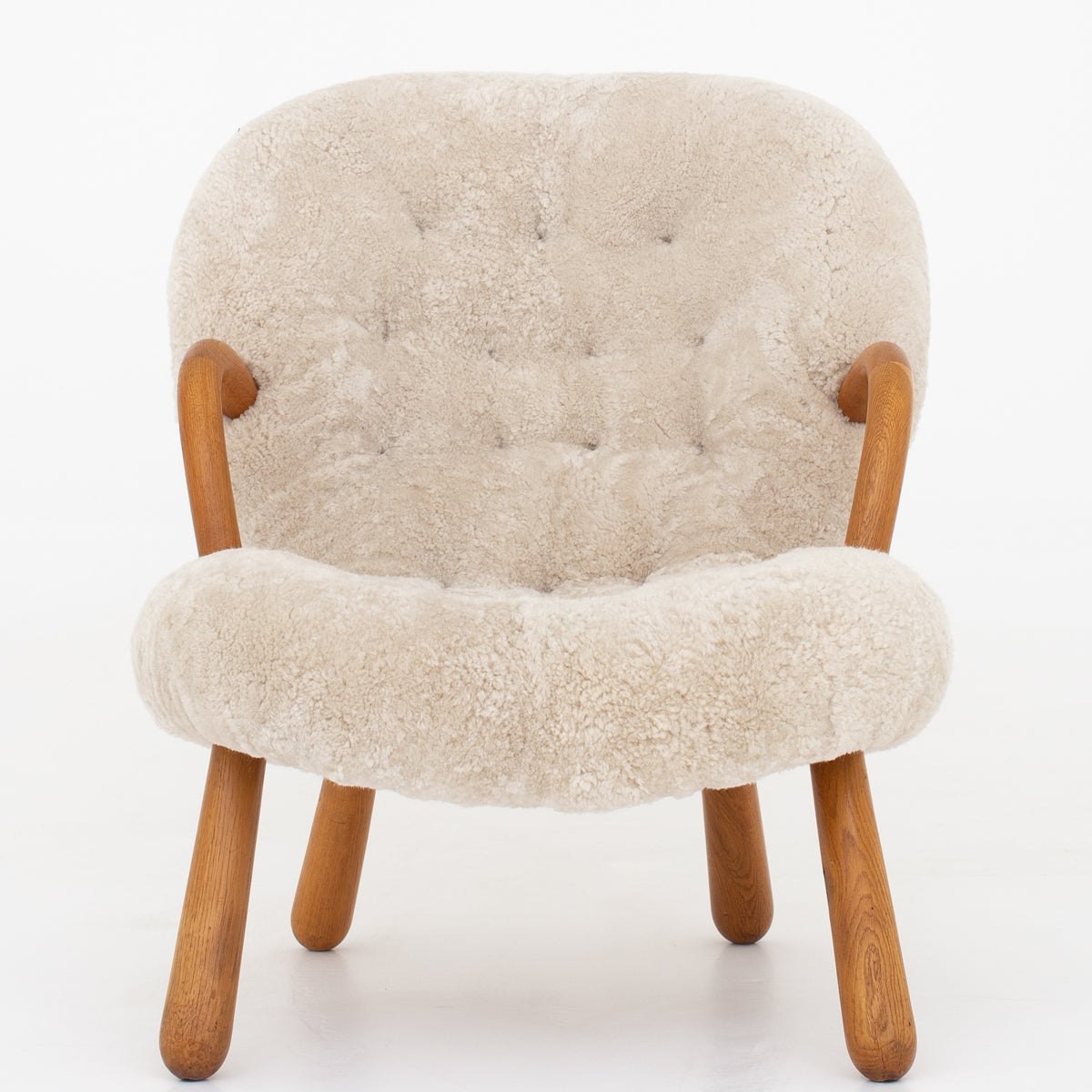 The Clam' in oak & lambs wool