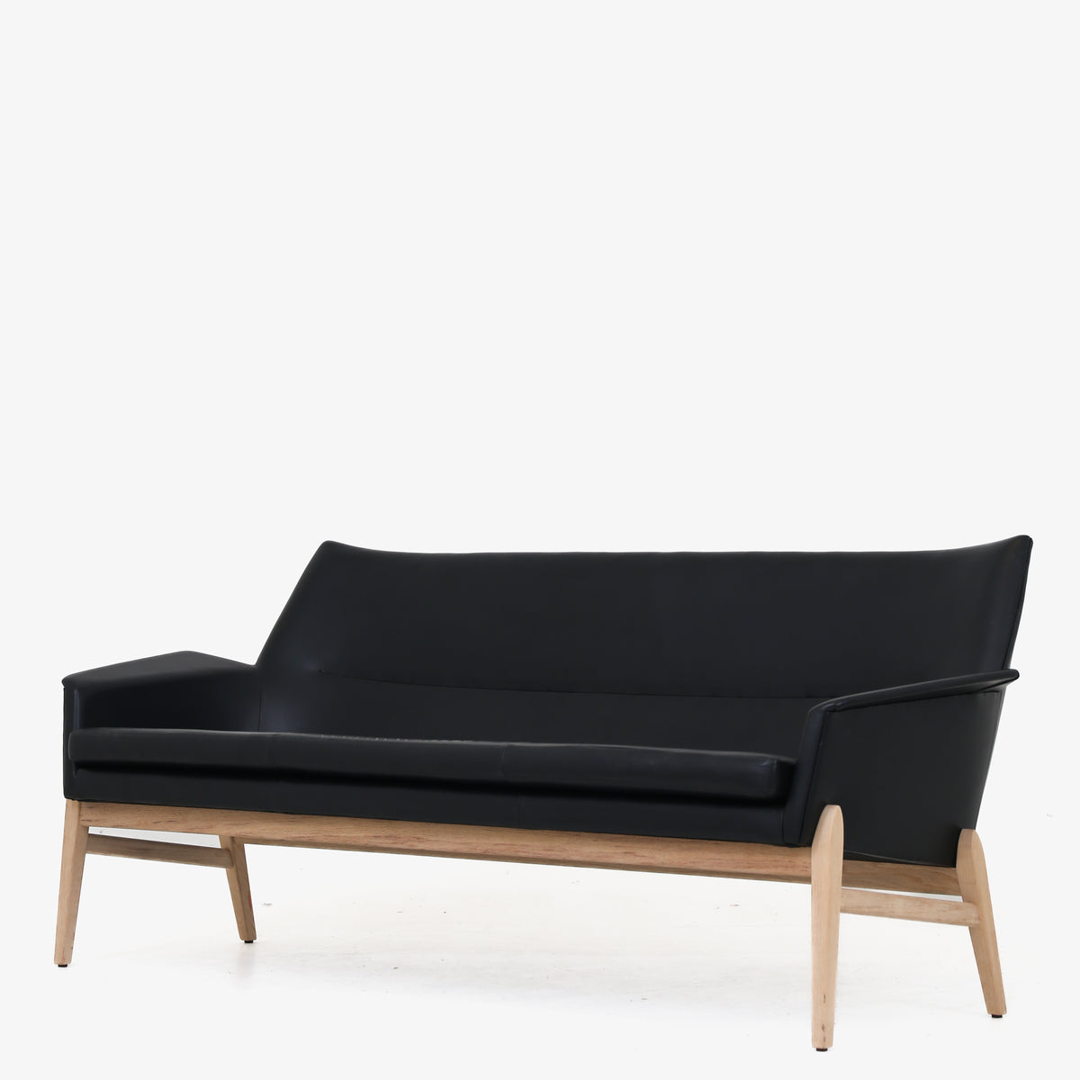 Wing' sofa in black leather