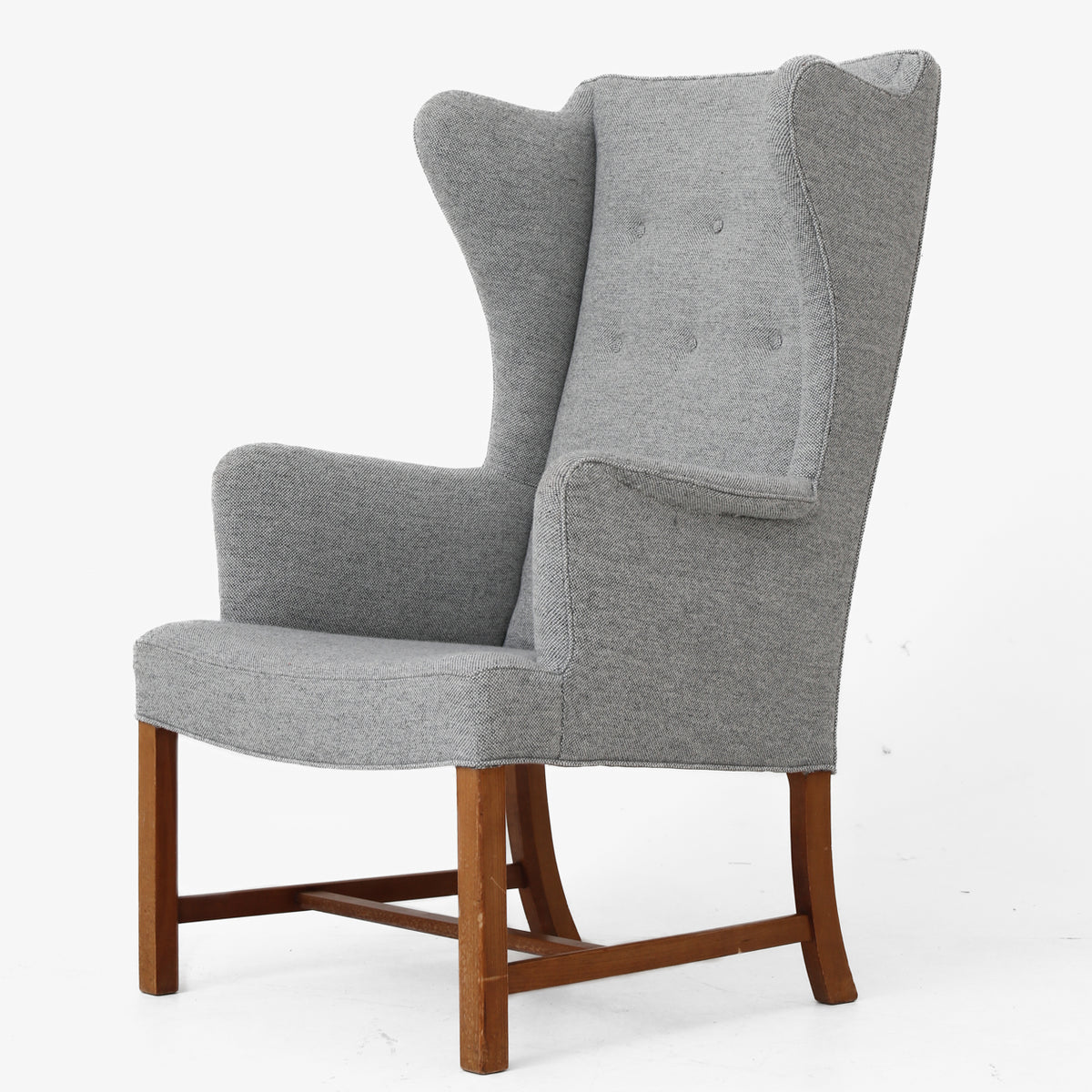 Wing-back chair in cherry