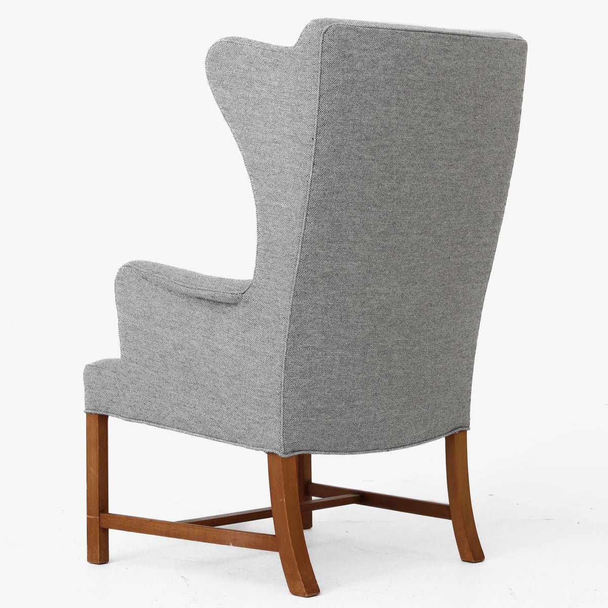 Wing-back chair in cherry