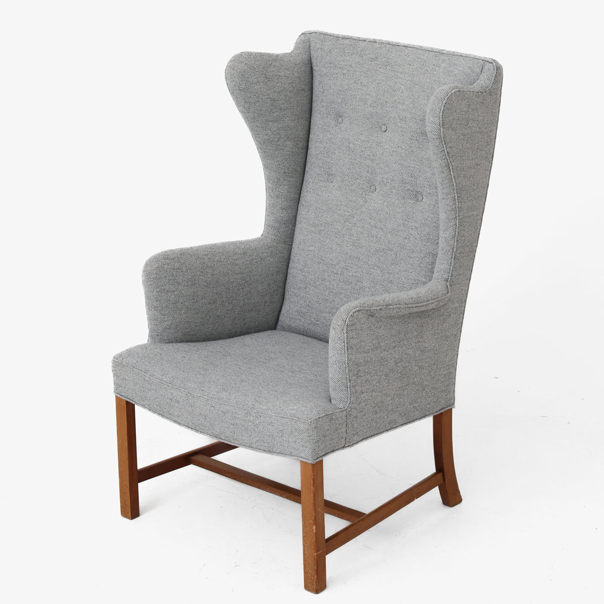 Wing-back chair in cherry