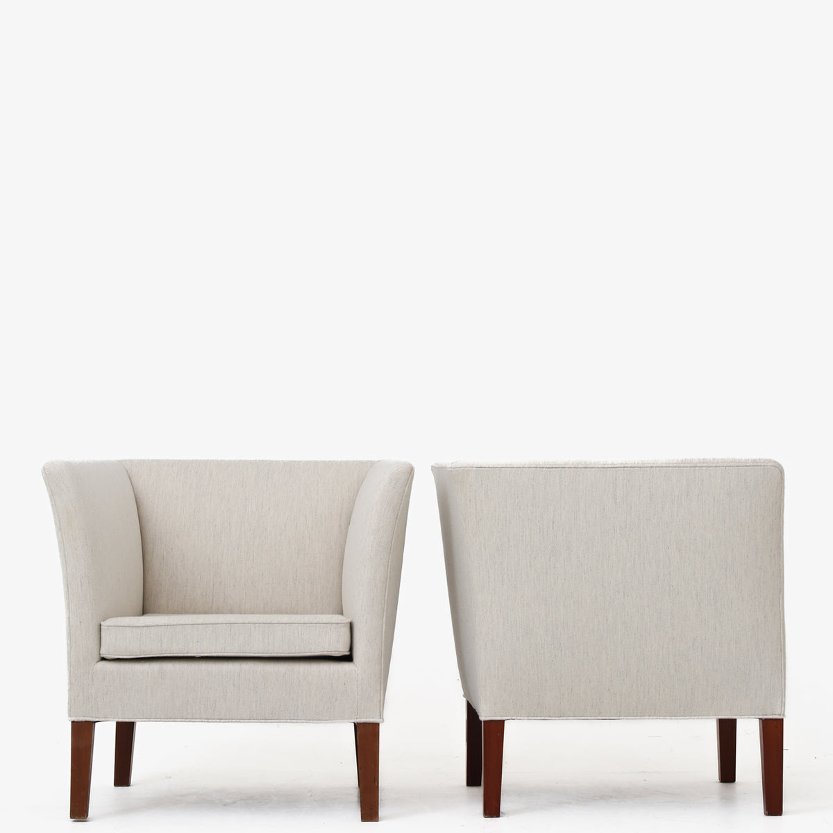 A rare pair of easy chairs