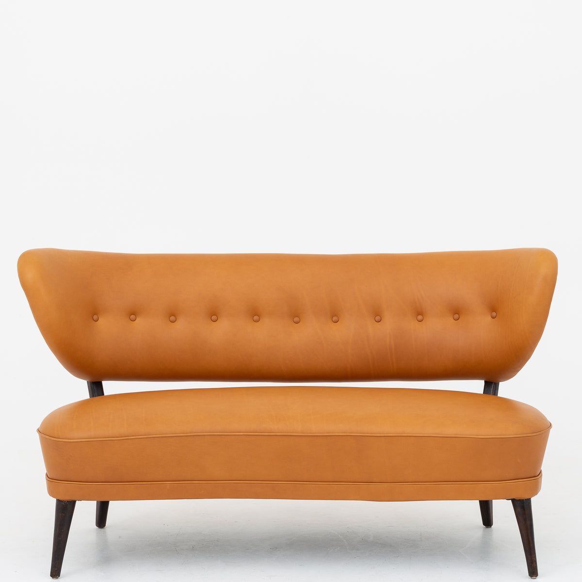 Sofa in cognac leather