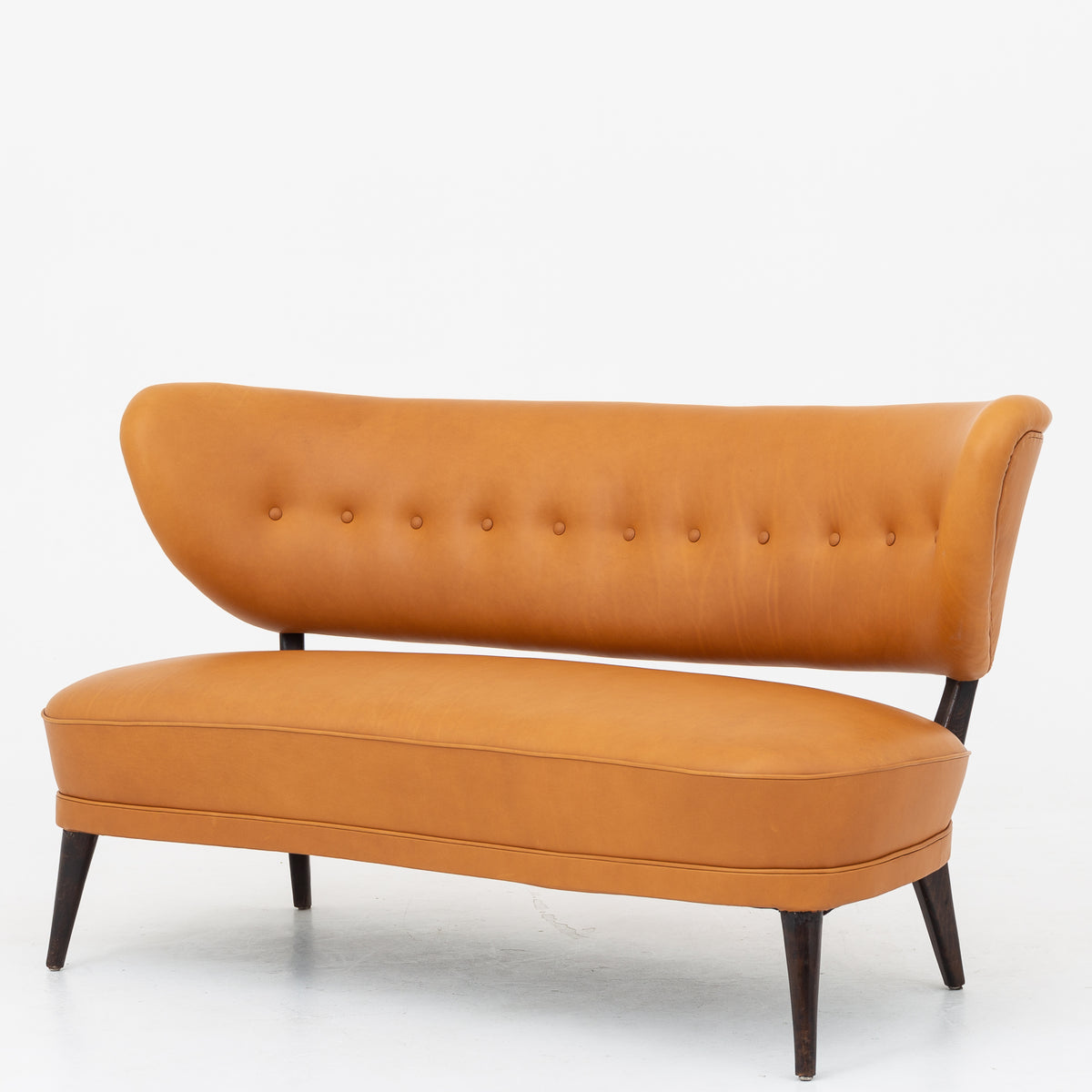 Sofa in cognac leather