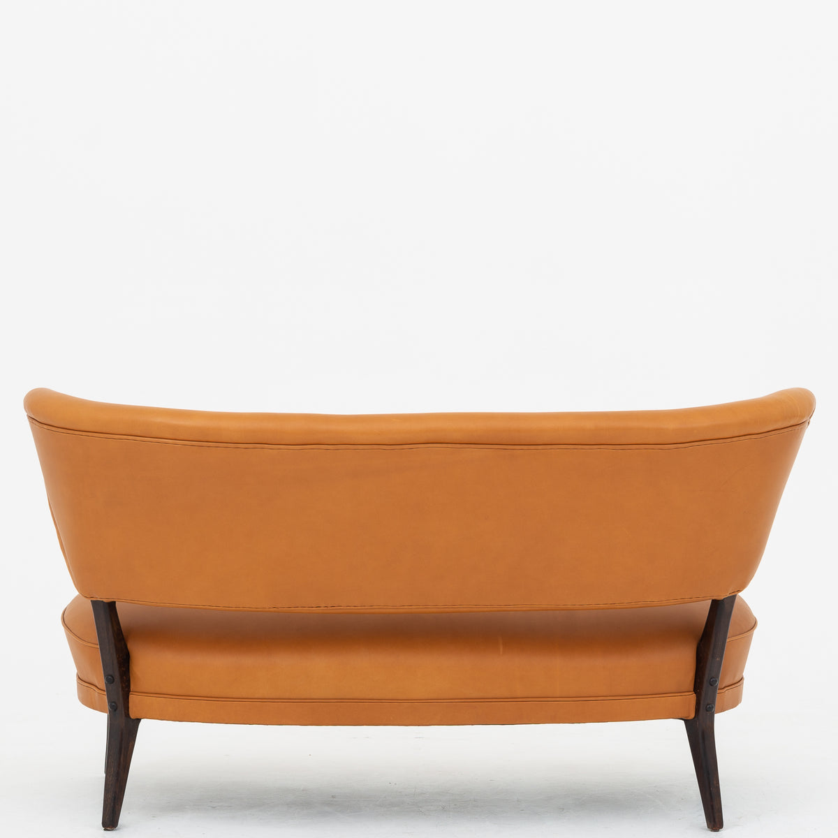 Sofa in cognac leather